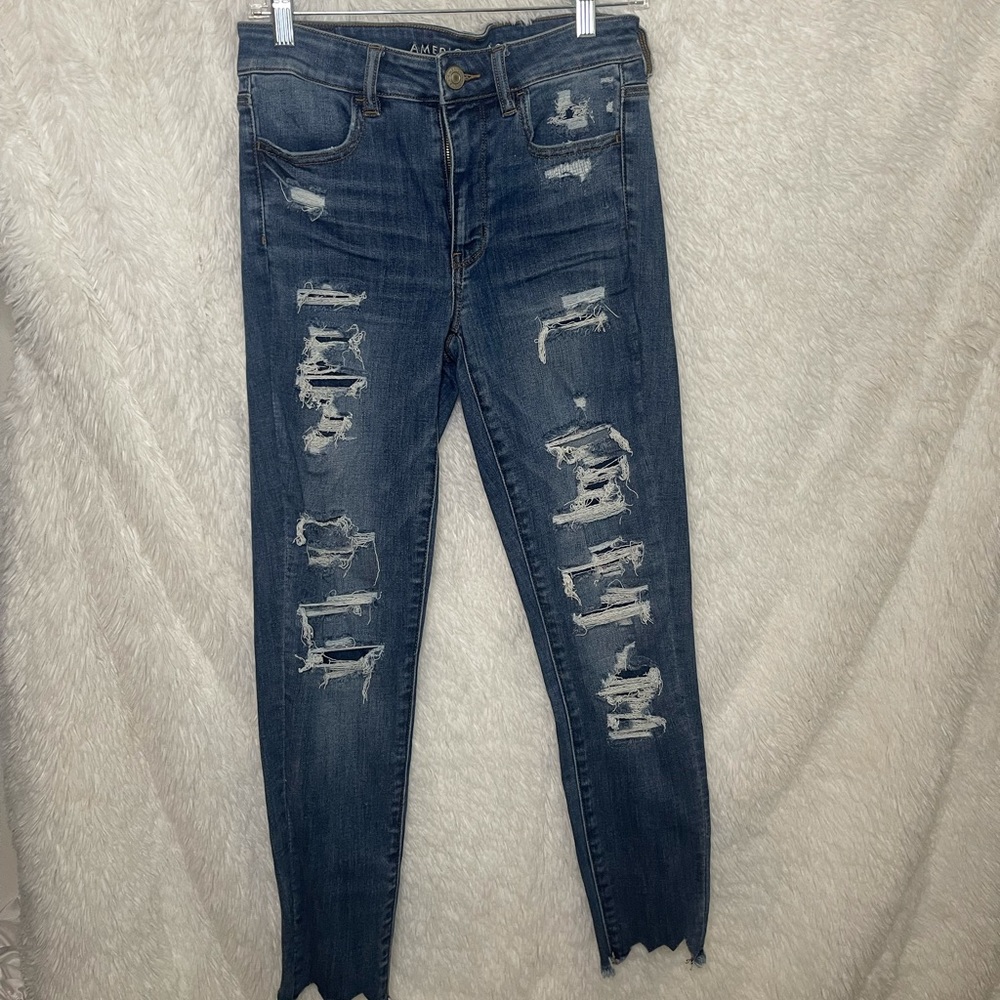 AE jeans with many rips